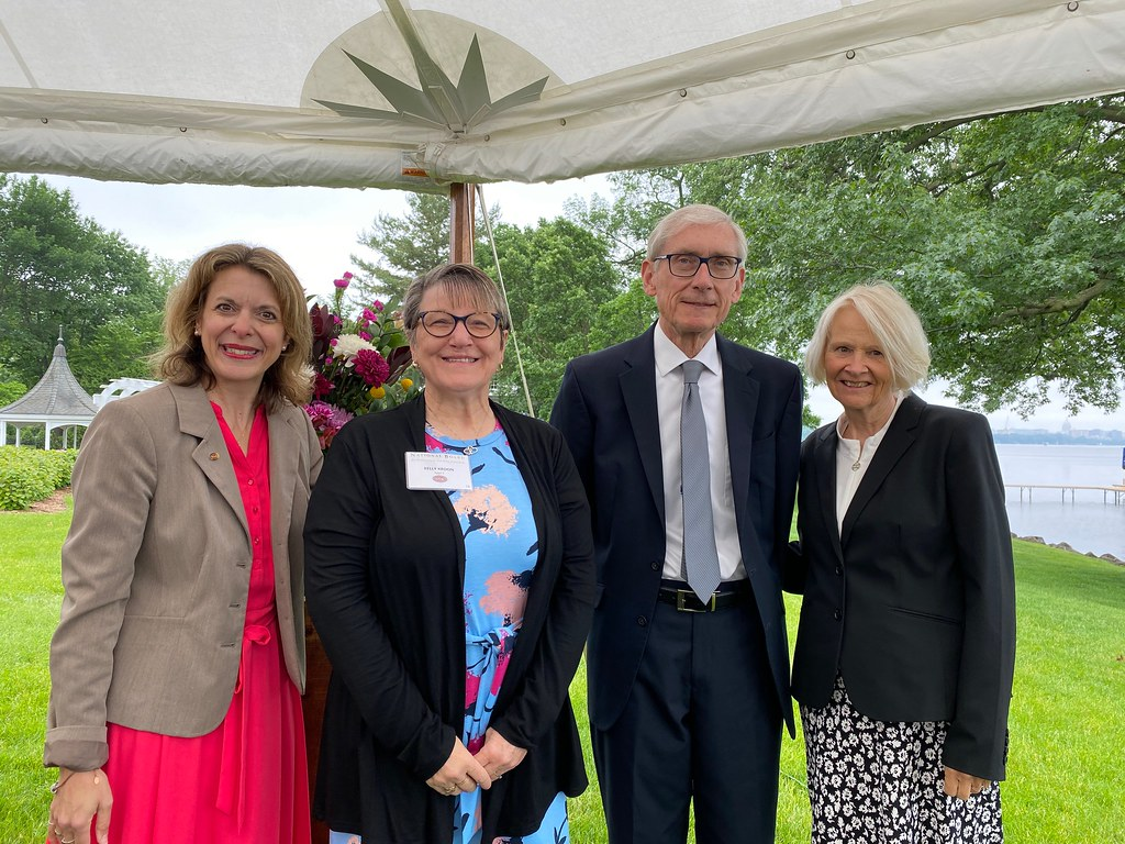 Kelly with Governor Evers, his wife, and another individual