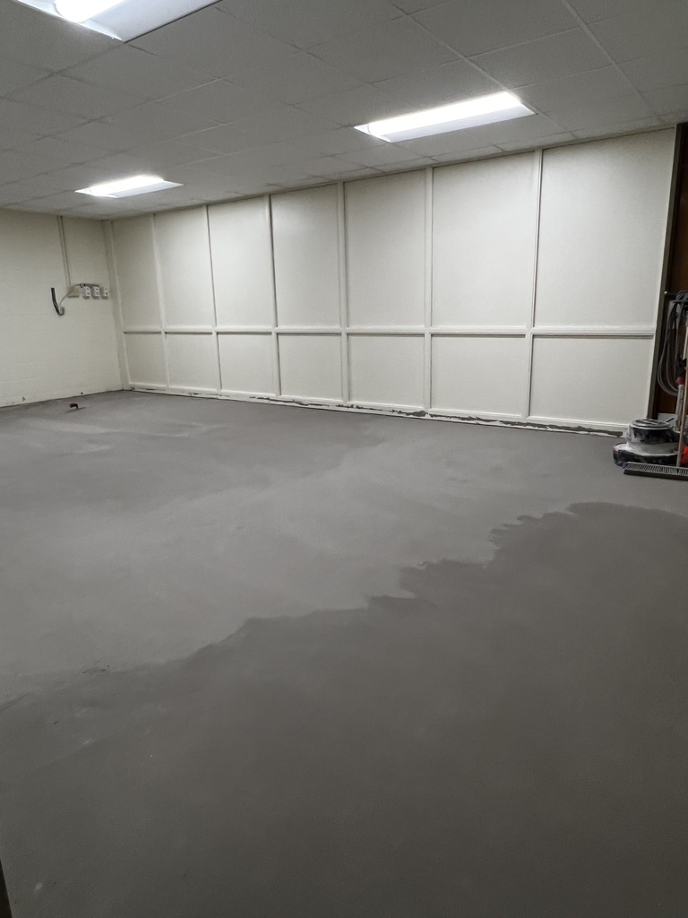 HS teacher lounge with flooring removed