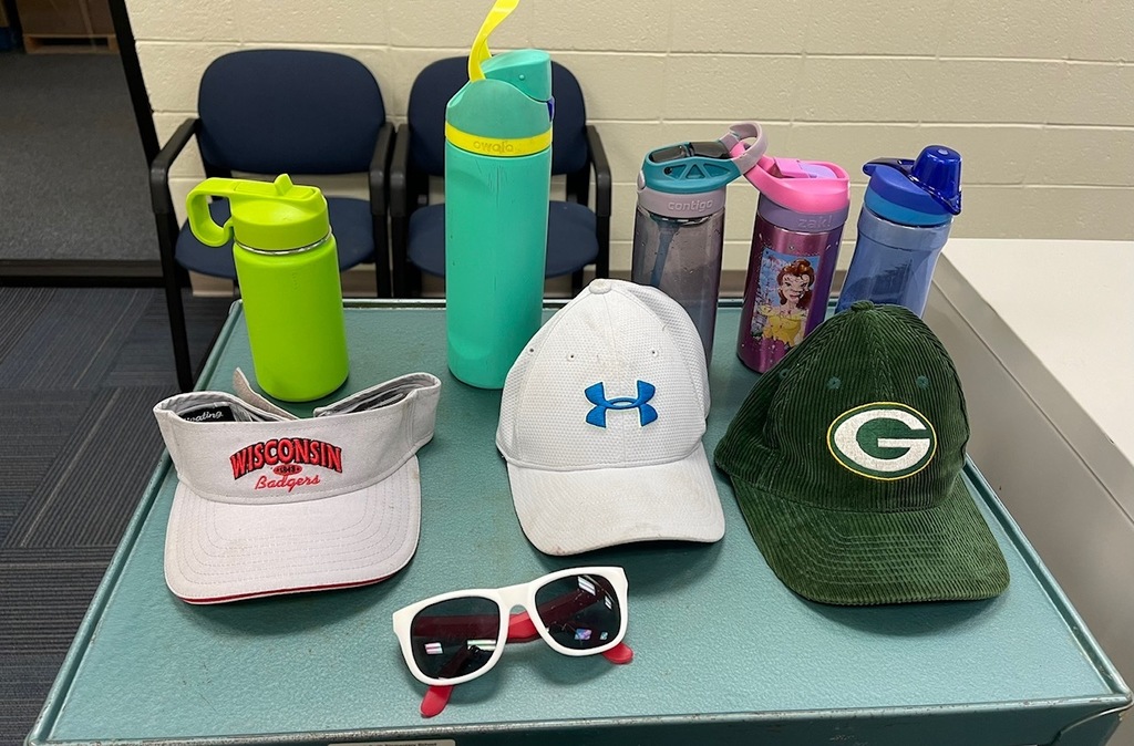 Water bottles, sunglasses, hats